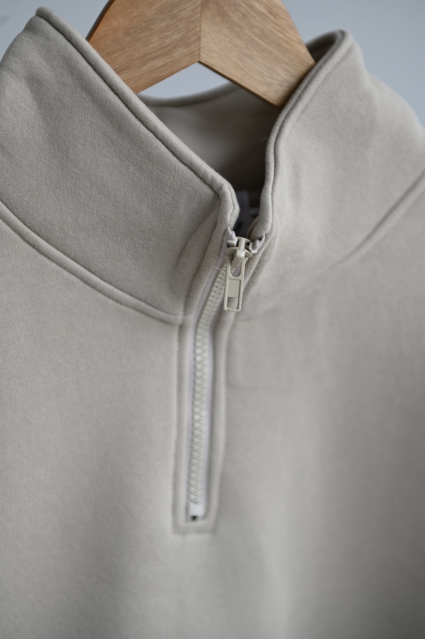 STONE Quarter zip.