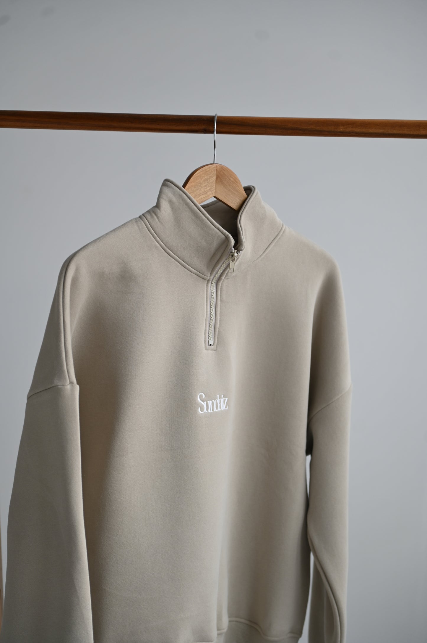STONE Quarter zip.