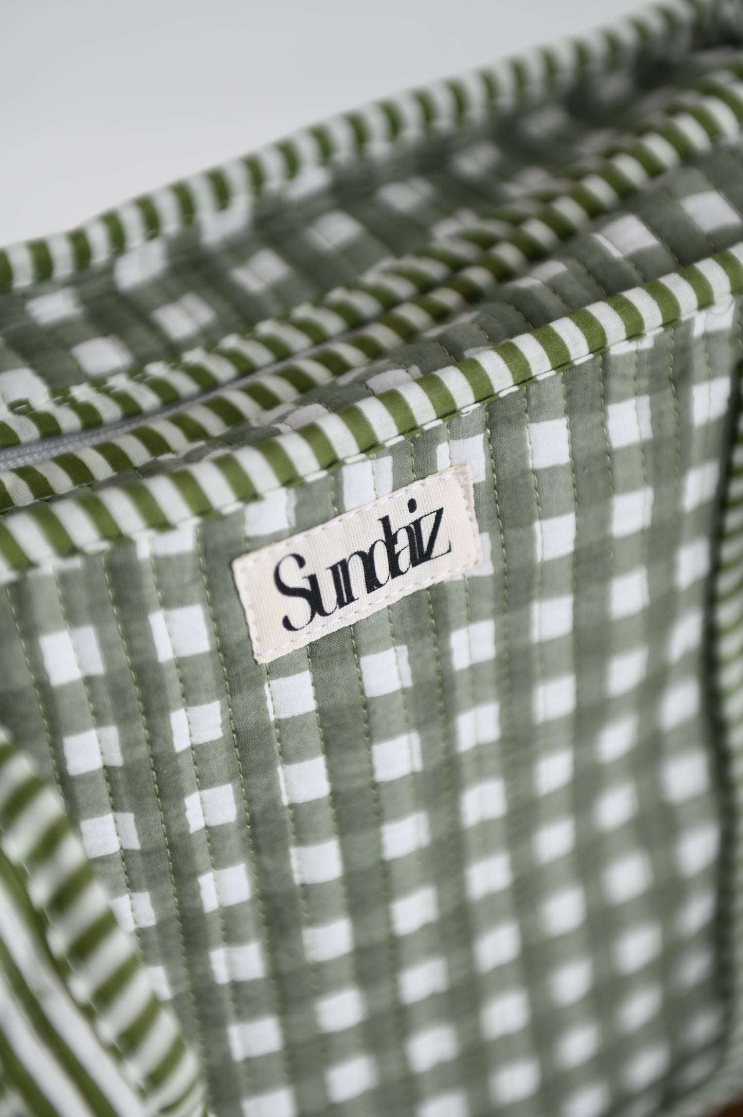 Sage gingham tote bags.
