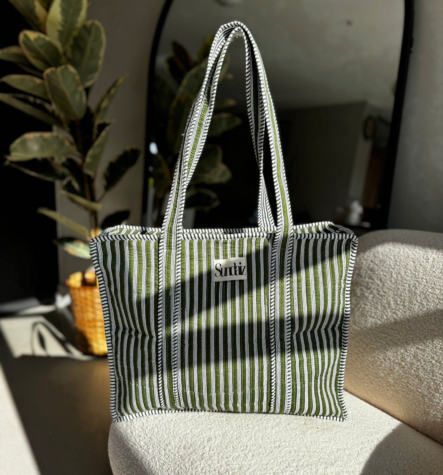 Olive stripe bags.