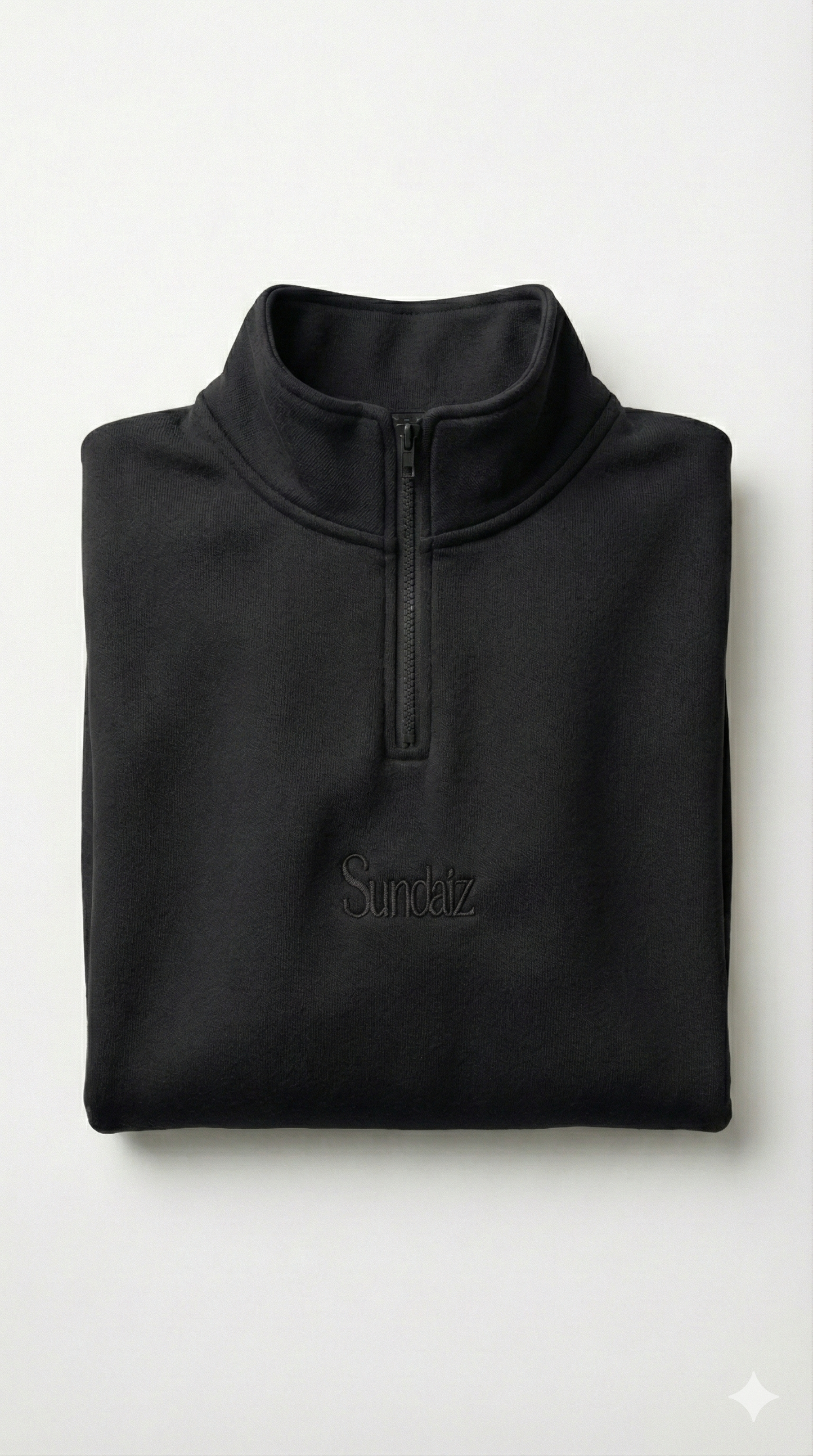 Quarter zip in Black.