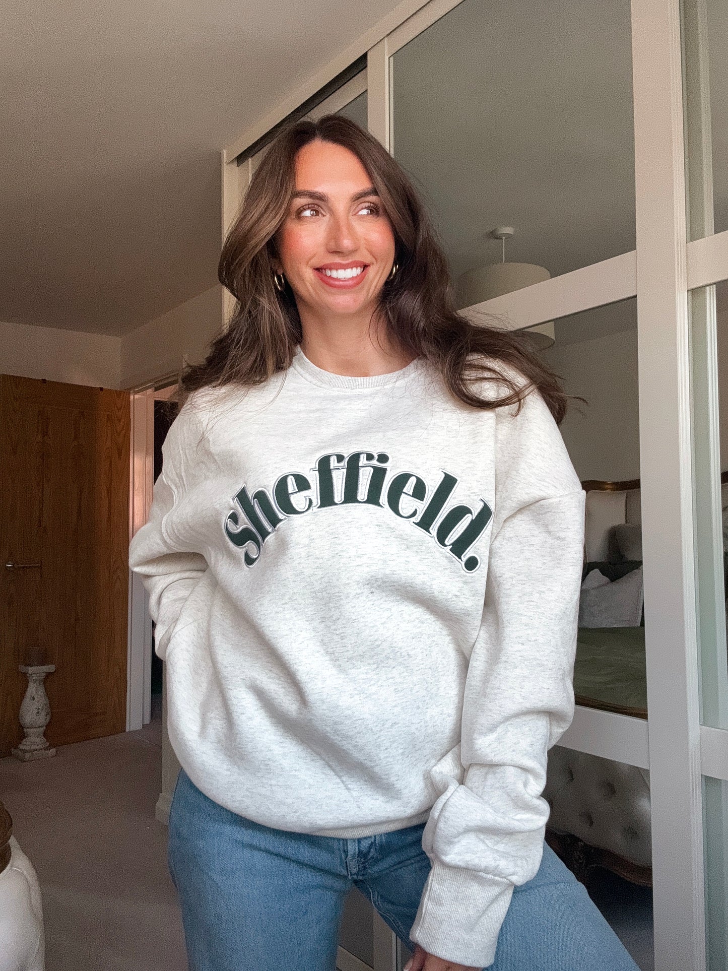 SHEFFIELD sweatshirt with forest green writing,
