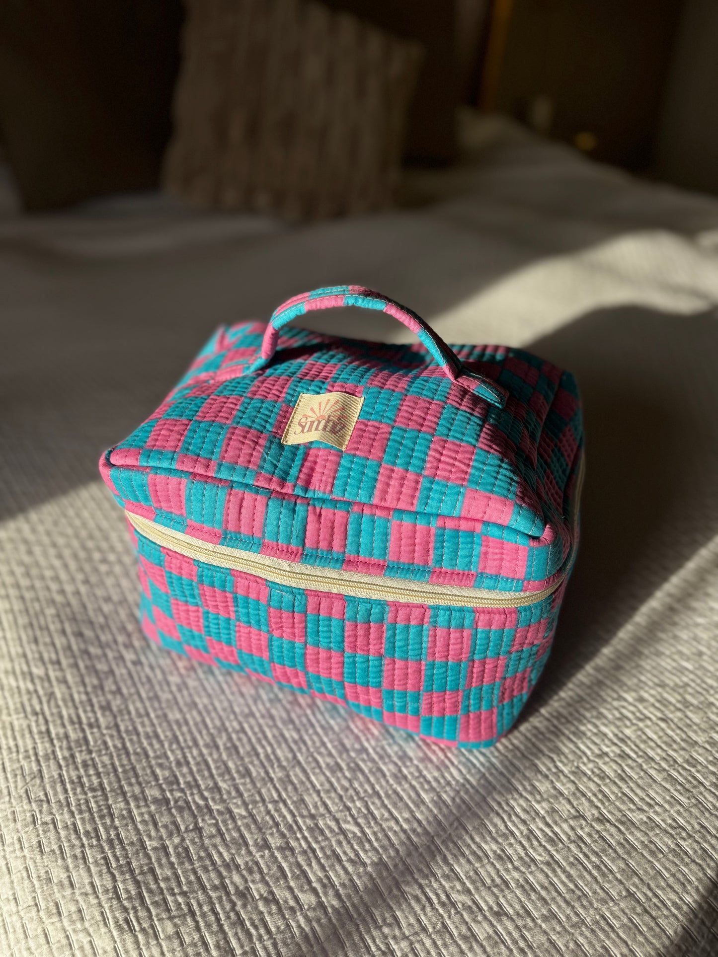 The Pink and Blue chequerboard multipurpose bag.