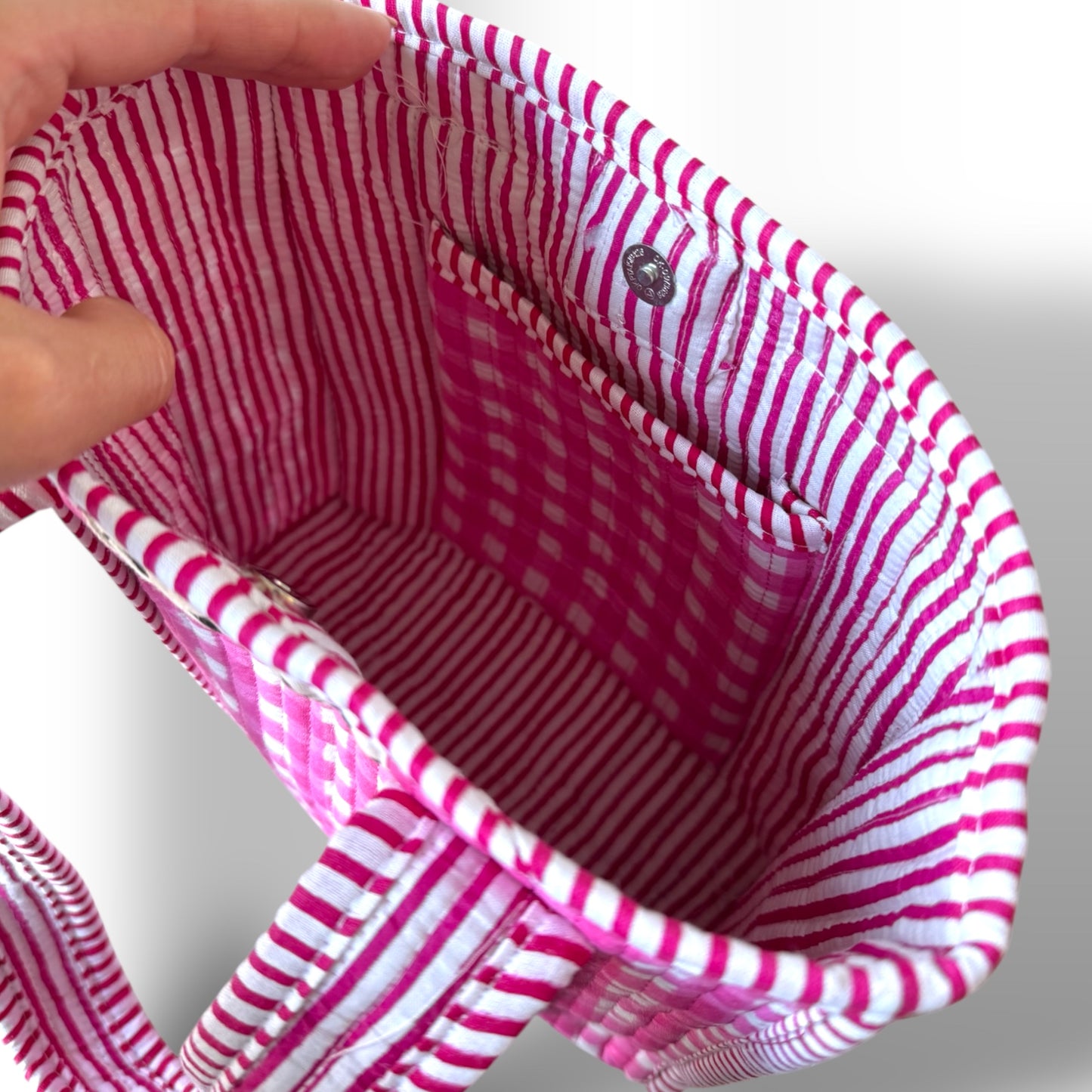 Mini top handle tote bags.