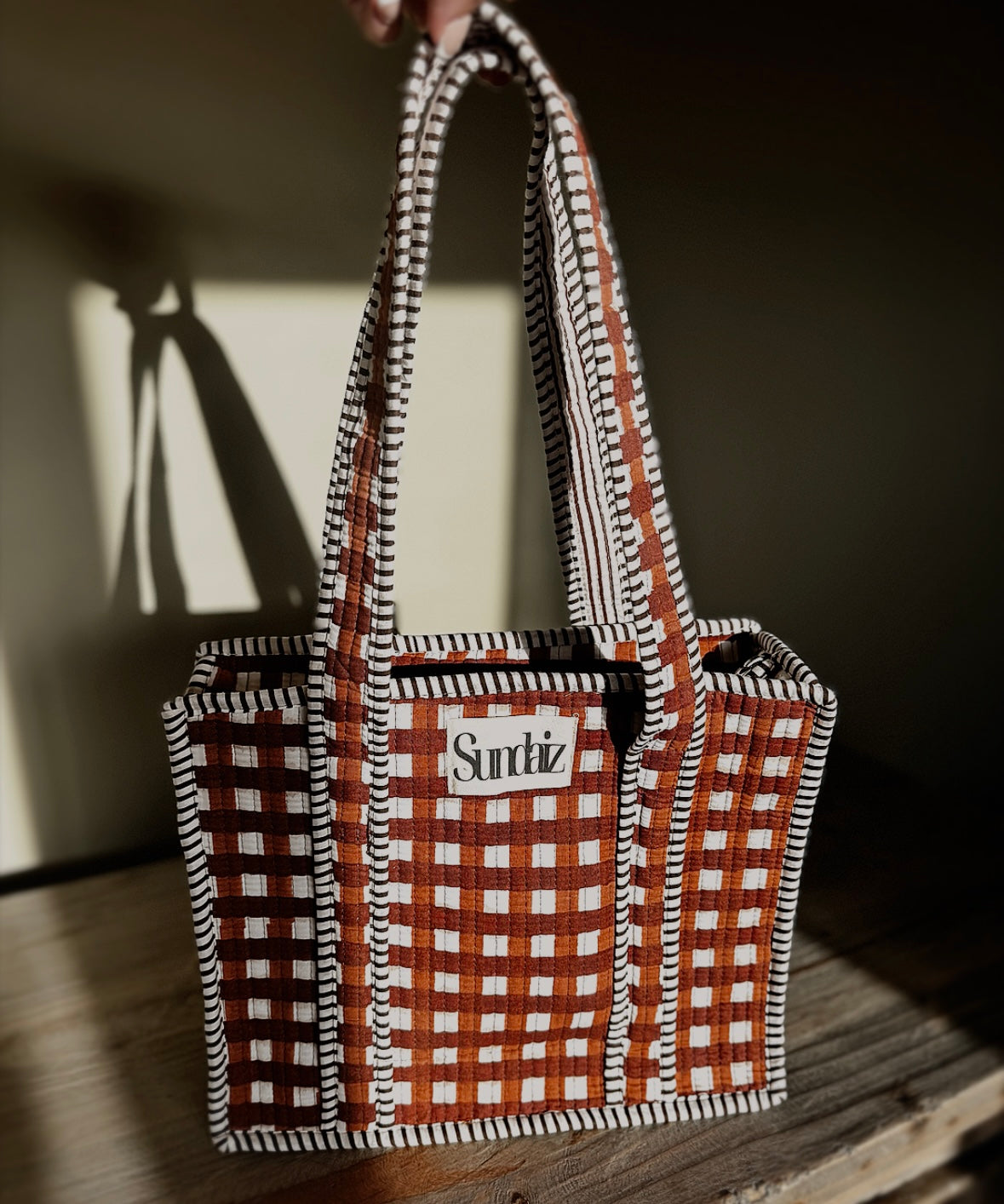 Chocolate gingham bags.