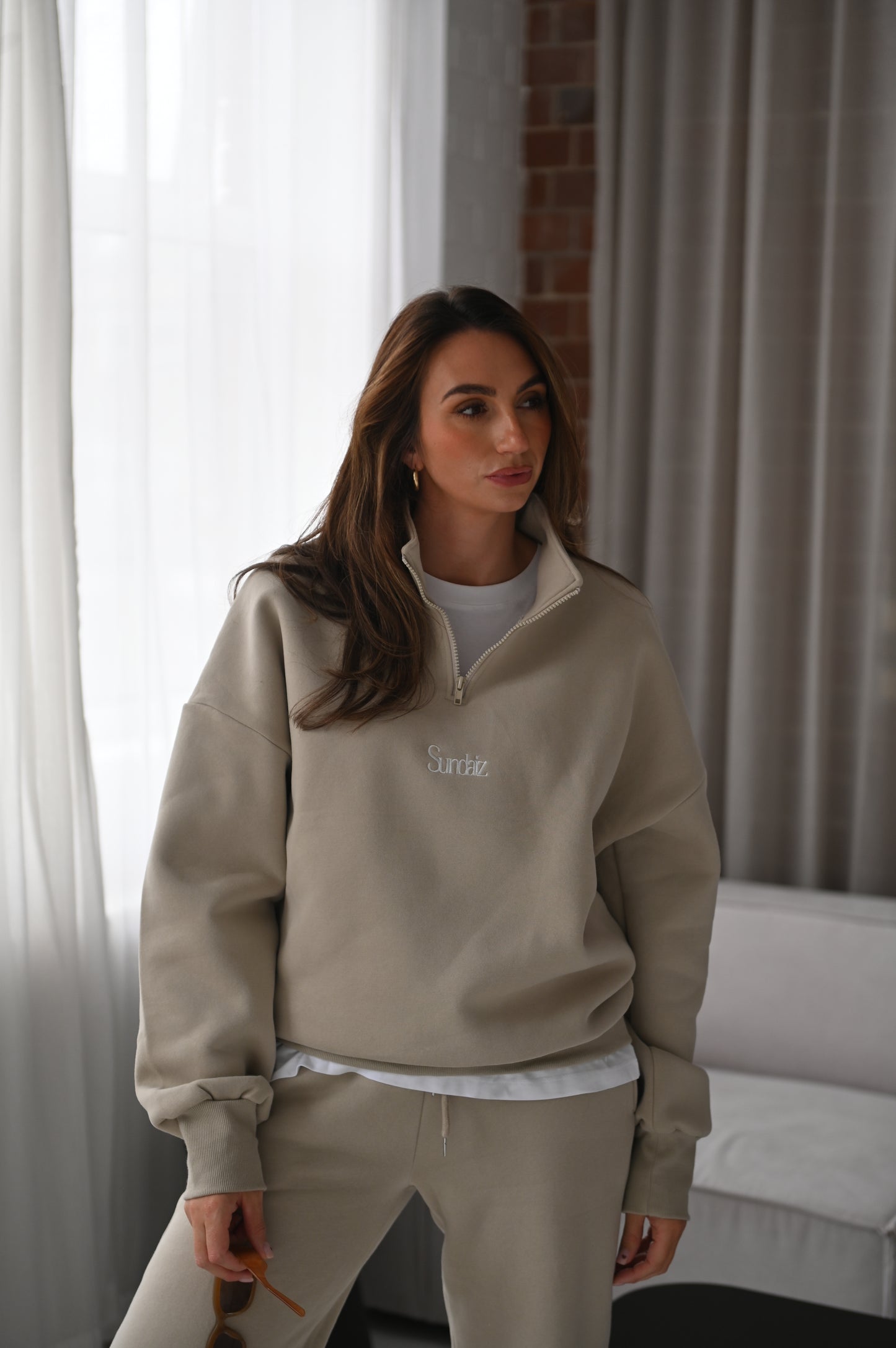 STONE Quarter zip.