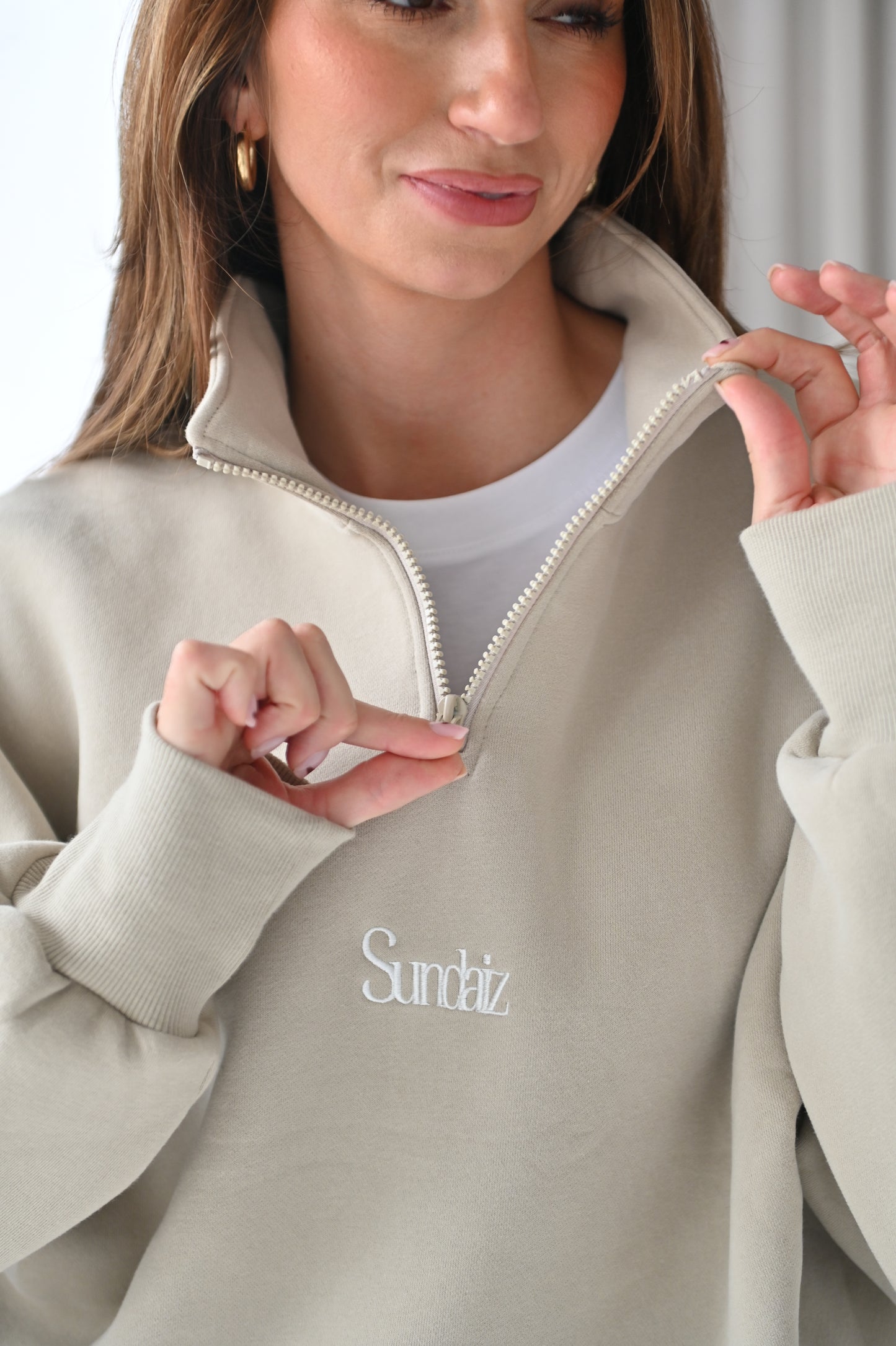STONE Quarter zip.