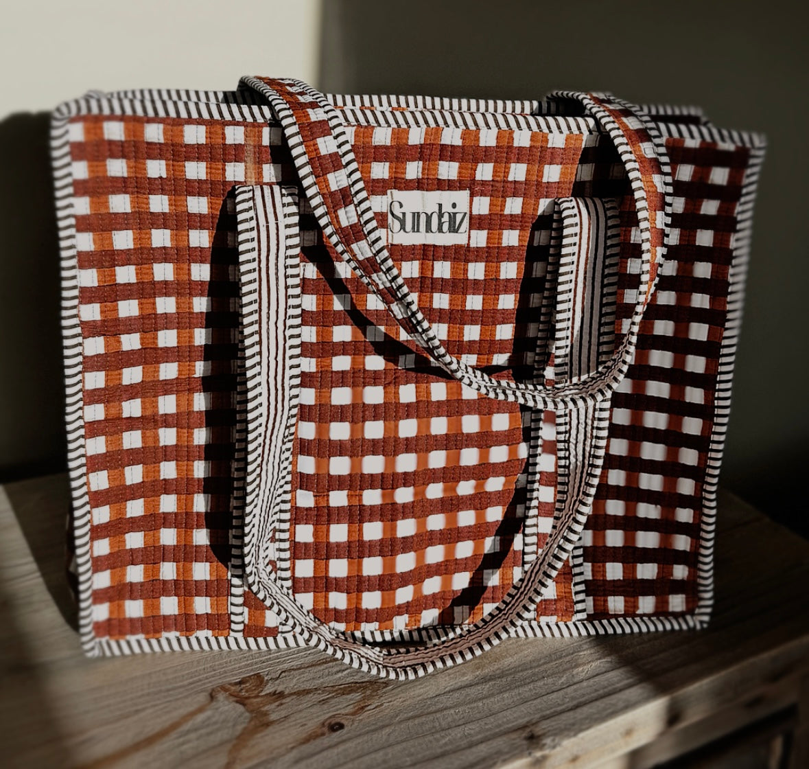 Chocolate gingham bags.