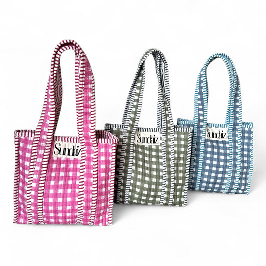 Mini top handle tote bags.