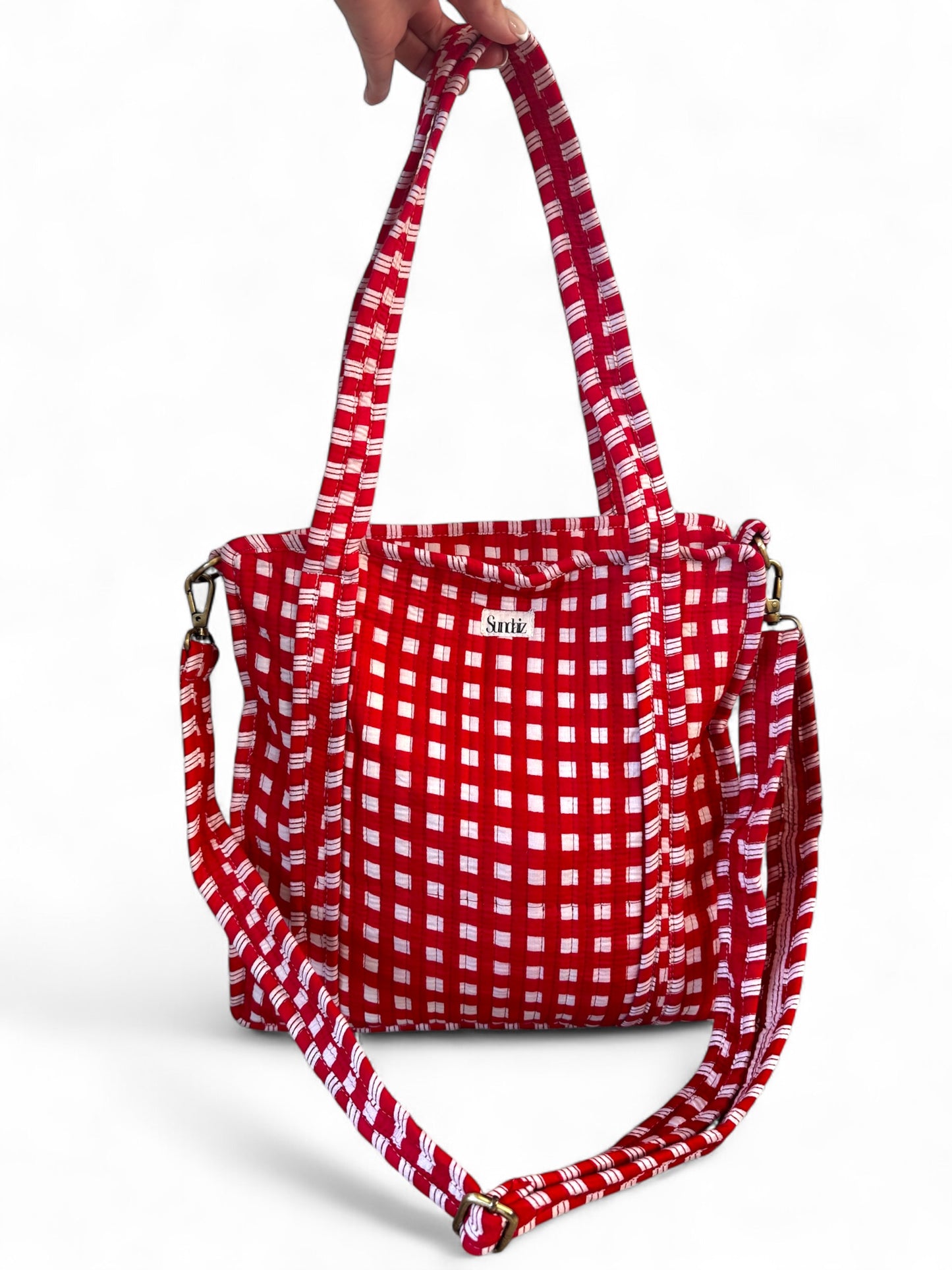 Red gingham tote bags.
